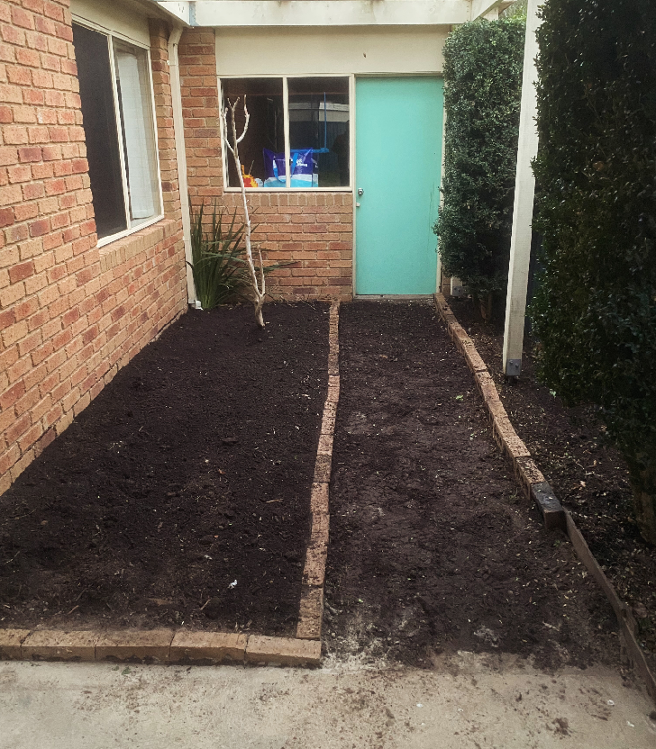 Courtyard garden bed reset in Pakenham after Knights Mowing service