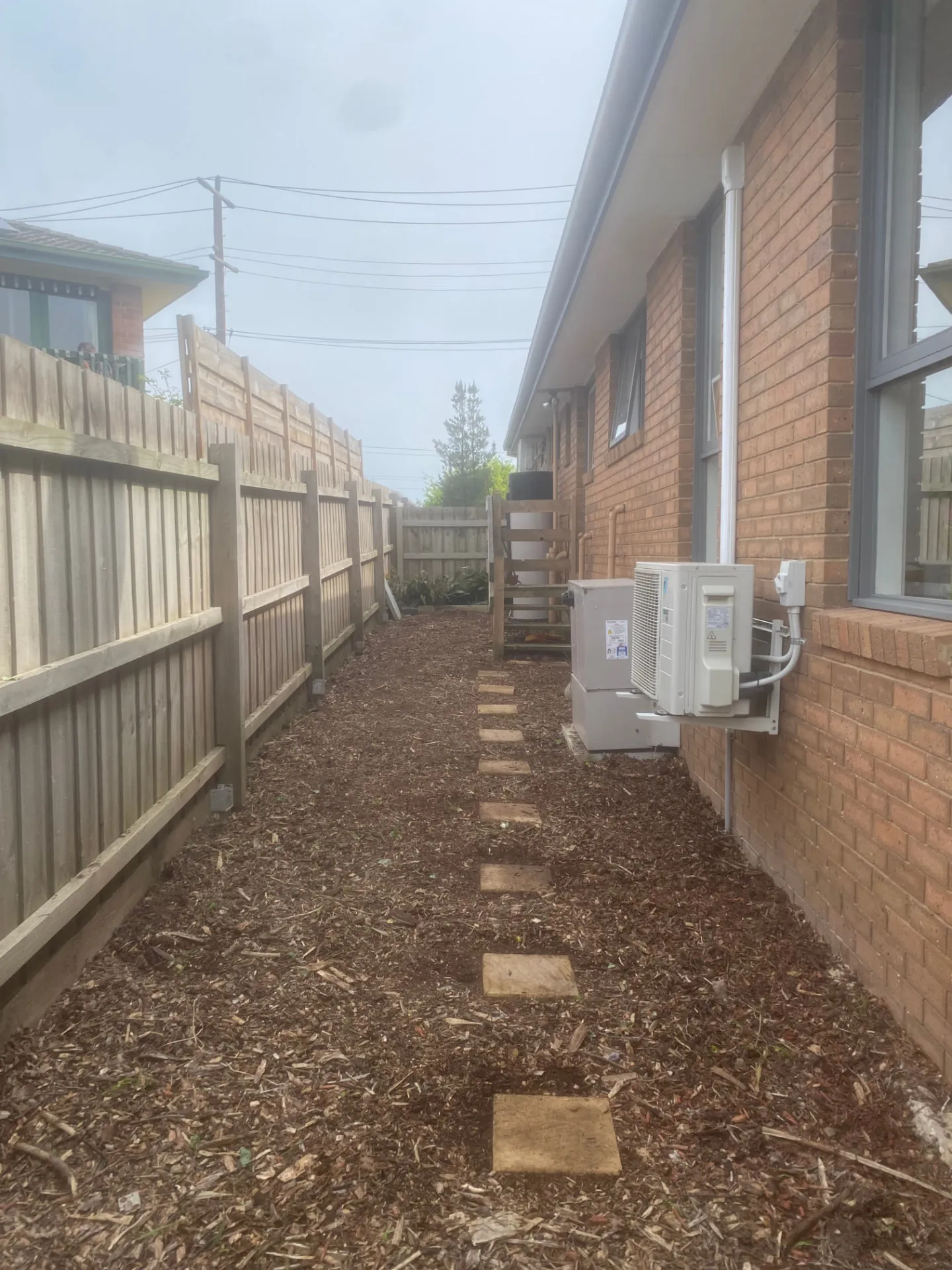 Cleared and tidied side garden after an end-of-lease cleanup